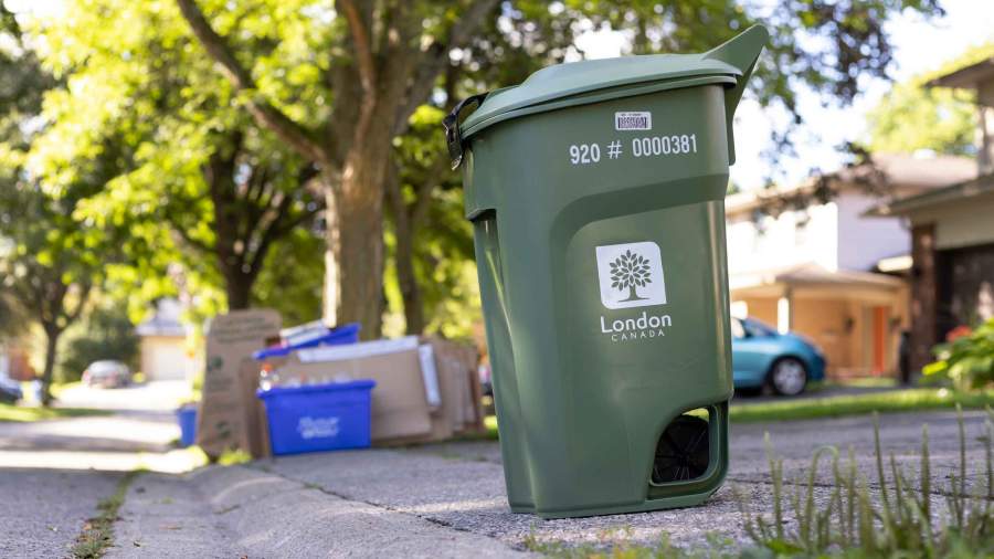 A Green Bin placed at the curb